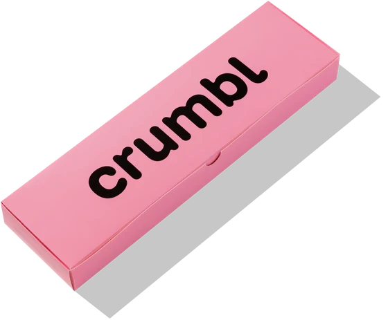 A closed pink Crumbl cookies four-pack box